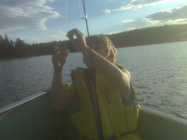 Adam un-tangling his line on the way to Dad's Cove at Roche Lake BC July 10, 2010